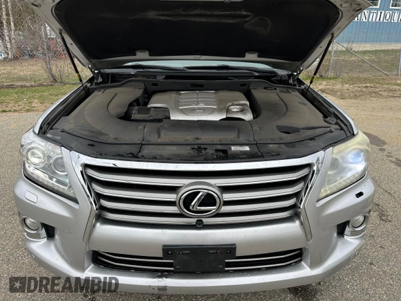 2013 Lexus LX 570 with VIN JTJHY7AX9D4100920, listed as a Copart auction lot 54273215 with 229,058 mi miles and Clean Title. Bid and sale history available at DreamBid. Image 7.