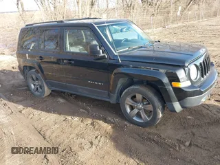 2014 Jeep Patriot High Altitude with VIN 1C4NJPFAXED888929, listed as a IAAI auction lot 41474736 with 117,697 mi miles and . Bid and sale history available at carsss.com. Image 1.