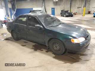 1999 Toyota Corolla VE with VIN 2T1BR12E2XC136739, listed as a Copart auction lot 60693625 with 170,989 mi miles and Salvage title. Bid and sale history available at DreamBid. Image 4.