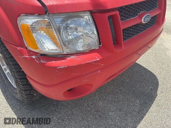 2004 Ford Explorer Sport Trac XLS z VIN 1FMZU67KX4UC40253, wystawiony jako IAAI lot #42894779 z przebiegiem 165 814 mil mil oraz . Historia ofert i sprzedaży dostępna na DreamBid. Obrazek 16.