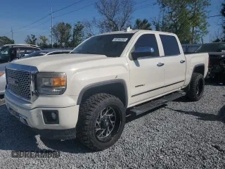 2015 GMC Sierra 1500 Denali with VIN 3GTU2WEJ6FG469971, listed as a Copart auction lot 49160265 with 50,995 mi miles and Clean Title. Bid and sale history available at carsss.com. Image 1.