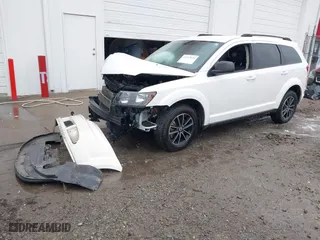 2018 Dodge Journey SE with VIN 3C4PDCAB9JT363759, listed as a IAAI auction lot 41262025 with 145,471 mi miles. Bid and sale history available at carsss.com. Image 17.