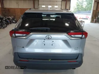 2021 Toyota RAV4 XLE with VIN 2T3P1RFV5MC180890, listed as a IAAI auction lot 42567858 with 56,961 mi miles and . Bid and sale history available at DreamBid. Image 15.