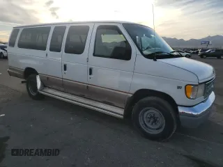 2000 Ford Econoline Passenger XL with VIN 1FBSS31L5YHA09064, listed as a Copart auction lot 84828844 with 257,973 mi miles and Salvage Title. Bid and sale history available at DreamBid. Image 4.