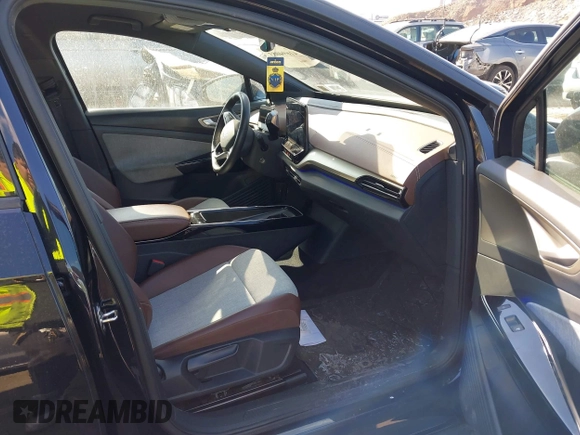 2023 Volkswagen ID.4 Pro with VIN 1V2CMPE8XPC018893, listed as a IAAI auction lot 41694083 with 31,875 mi miles and . Bid and sale history available at DreamBid. Image 5.