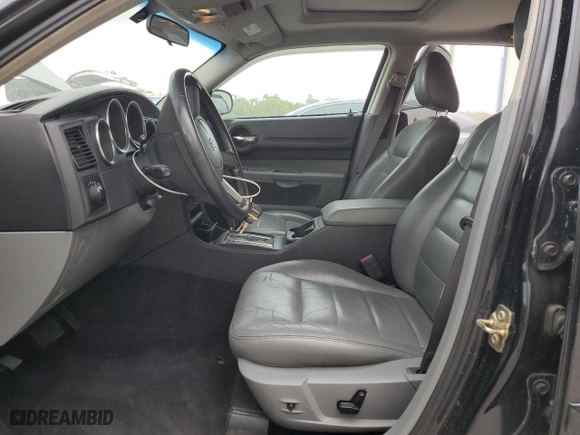 2005 Dodge Magnum SE with VIN 2D4FV48V65H510653, listed as a Copart auction lot 70927144 with 105,350 mi miles and Salvage Title. Bid and sale history available at carsss.com. Image 7.