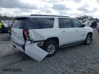 2019 Chevrolet Suburban LT with VIN 1GNSCHKC8KR405969, listed as a IAAI auction lot 41532271 with 107,003 mi miles. Bid and sale history available at carsss.com. Image 4.