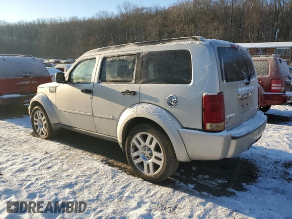2008 Dodge Nitro SLT z VIN 1D8GU58K68W211350, wystawiony jako Copart lot #86813294 z przebiegiem Nie podano mil oraz Szkoda całkowita • Salvage title. Historia ofert i sprzedaży dostępna na DreamBid. Obrazek 2.
