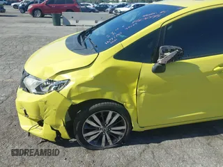 2016 Honda Fit EX z VIN JHMGK5H7XGS003430, wystawiony jako IAAI lot #42676495 z przebiegiem 167 100 mil mil oraz . Historia ofert i sprzedaży dostępna na DreamBid. Obrazek 19.