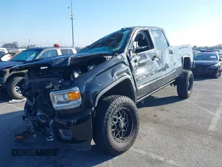 2019 GMC Sierra 2500HD Denali with VIN 1GT12SEYXKF222893, listed as a IAAI auction lot 41722342 with 114,613 mi miles. Bid and sale history available at carsss.com. Image 2.
