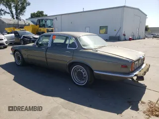 1974 Jaguar XJ with VIN UE2T52398, listed as a Copart auction lot 59589415 with 93,740 mi miles and Clean title. Bid and sale history available at DreamBid. Image 2.