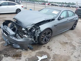 2014 BMW M6 with VIN WBS6C9C54EDV73926, listed as a IAAI auction lot 42421586 with 82,216 mi miles and . Bid and sale history available at DreamBid. Image 2.
