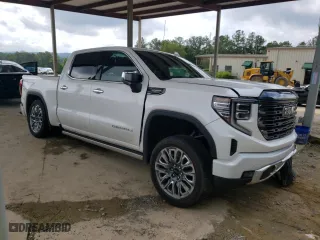 2023 GMC Sierra 1500 Denali Ultimate with VIN 1GTUUHEL0PZ318889, listed as a Copart auction lot 71713984 with 8,986 mi miles and Salvage Title. Bid and sale history available at carsss.com. Image 4.
