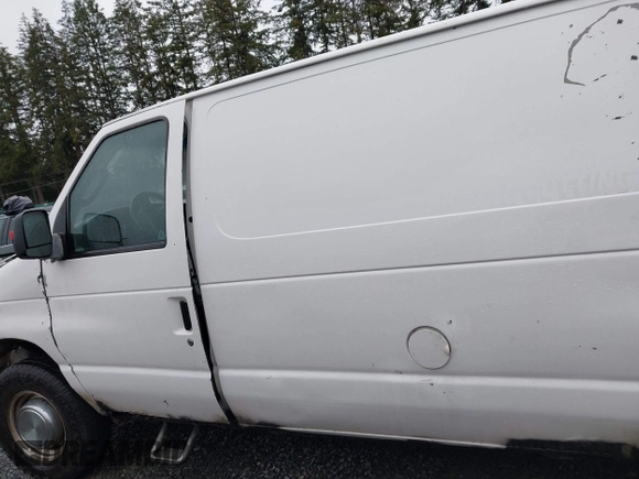 2004 Ford Econoline Cargo with VIN 1FTSS34L84HA56056, listed as a IAAI auction lot 41235862 with 215,095 mi miles and . Bid and sale history available at DreamBid. Image 14.