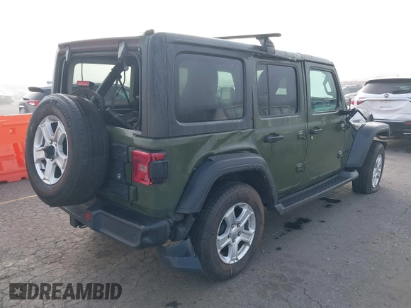 2021 Jeep Wrangler Unlimited Willys with VIN 1C4HJXDM1MW812674, listed as a IAAI auction lot 41670637 with 59,241 mi miles and . Bid and sale history available at DreamBid. Image 4.
