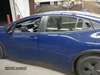 2024 Toyota Prius LE with VIN JTDACAAU0R3030582, listed as a IAAI auction lot 41838615 with 9,402 mi miles and . Bid and sale history available at DreamBid. Image 14.