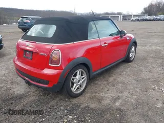 2010 MINI Convertible S with VIN WMWMS3C58ATY09229, listed as a IAAI auction lot 42055305 with 142,396 mi miles and . Bid and sale history available at DreamBid. Image 4.
