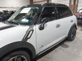 2016 MINI Countryman S with VIN WMWZC5C57GWU20085, listed as a IAAI auction lot 42403406 with 90,592 mi miles and . Bid and sale history available at DreamBid. Image 19.