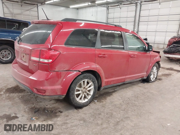 2014 Dodge Journey SXT with VIN 3C4PDCBG2ET188822, listed as a IAAI auction lot 41219215 with 174,053 mi miles. Bid and sale history available at carsss.com. Image 4.