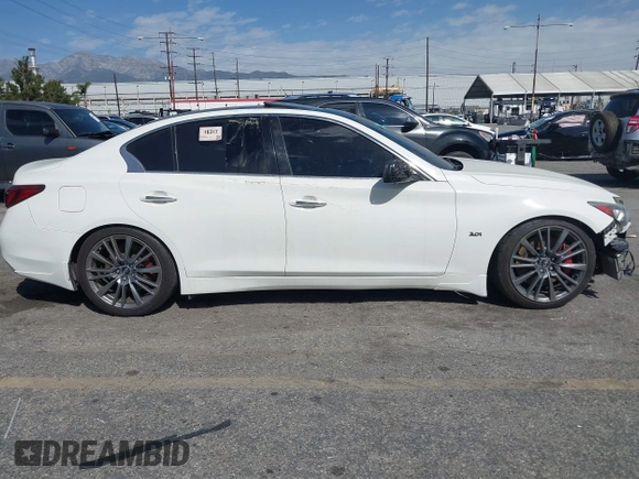 2019 Infiniti Q50 Luxe with VIN JN1EV7APXKM513850, listed as a IAAI auction lot 41689080 with 85,520 mi miles and . Bid and sale history available at DreamBid. Image 13.