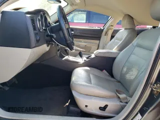 2005 Dodge Magnum SE z VIN 2D4FV48V05H190343, wystawiony jako Copart lot #75058534 z przebiegiem 180 373 mil mil oraz Szkoda całkowita • Salvage title. Historia ofert i sprzedaży dostępna na DreamBid. Obrazek 7.
