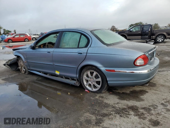 2004 Jaguar X-Type z VIN SAJEB52D54XD68737, wystawiony jako Copart lot #85168784 z przebiegiem 150 975 mil mil oraz Szkoda całkowita • Salvage title. Historia ofert i sprzedaży dostępna na DreamBid. Obrazek 2.