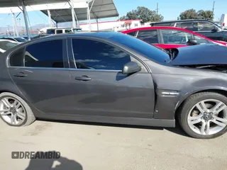 2008 Pontiac G8 with VIN 6G2ER57798L988697, listed as a IAAI auction lot 41690384 with 166,798 mi miles. Bid and sale history available at carsss.com. Image 14.