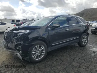 2023 Cadillac XT5 AWD Premium Luxury with VIN 1GYKNDRS6PZ144478, listed as a Copart auction lot 45291295 with 45,910 mi miles and Non Repairable. Bid and sale history available at DreamBid. Image 1.