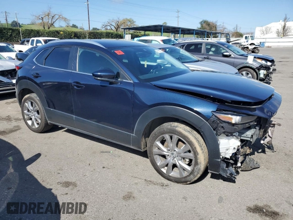 2023 Mazda CX-30 S Carbon Edition with VIN 3MVDMBCM1PM582423, listed as a Copart auction lot 47998275 with 35,412 mi miles and Salvage title. Bid and sale history available at DreamBid. Image 4.