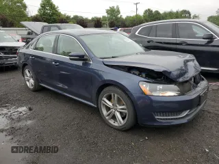 2014 Volkswagen Passat SE with VIN 1VWBP7A30EC008267, listed as a Copart auction lot 60261435 with 93,306 mi miles and Salvage title. Bid and sale history available at DreamBid. Image 4.