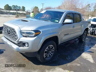 2023 Toyota Tacoma 4WD SR with VIN 3TYCZ5AN7PT122067, listed as a IAAI auction lot 41624047 with 27,483 mi miles. Bid and sale history available at carsss.com. Image 2.