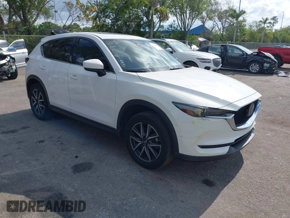 2018 Mazda CX-5 Grand Touring with VIN JM3KFBDM6J0451605, listed as a IAAI auction lot 42099182 with 81,703 mi miles and . Bid and sale history available at DreamBid. Image 1.
