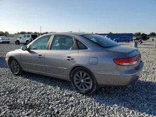 2007 Hyundai Azera SE z VIN KMHFC46F87A164195, wystawiony jako Copart lot #52500115 z przebiegiem 191 835 mil mil oraz Szkoda całkowita • Salvage title. Historia ofert i sprzedaży dostępna na DreamBid. Obrazek 2.