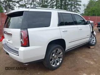 2016 GMC Yukon Denali with VIN 1GKS1CKJ7GR237852, listed as a IAAI auction lot 41944398 with 65,703 mi miles. Bid and sale history available at carsss.com. Image 4.
