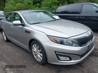 2014 Kia Optima EX z VIN 5XXGN4A70EG335090, wystawiony jako IAAI lot #42272655 z przebiegiem 165 795 mil mil oraz . Historia ofert i sprzedaży dostępna na DreamBid. Obrazek 1.