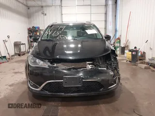 2020 Chrysler Pacifica Touring L with VIN 2C4RC1BG9LR140072, listed as a IAAI auction lot 42199118 with 93,557 mi miles and . Bid and sale history available at DreamBid. Image 13.