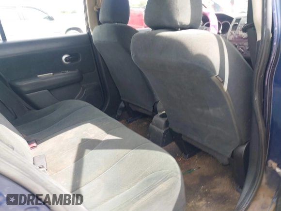 2011 Nissan Versa S with VIN 3N1BC1AP2BL408977, listed as a IAAI auction lot 42524102 with 195,285 mi miles and . Bid and sale history available at DreamBid. Image 8.