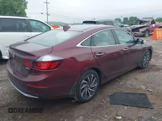 2020 Honda Insight Touring z VIN 19XZE4F93LE010040, wystawiony jako IAAI lot #42240572 z przebiegiem 52 299 mil mil oraz . Historia ofert i sprzedaży dostępna na DreamBid. Obrazek 4.
