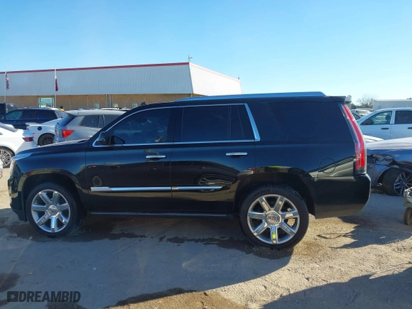 2015 Cadillac Escalade Premium with VIN 1GYS4CKJ0FR180180, listed as a IAAI auction lot 41054933 with 146,974 mi miles. Bid and sale history available at carsss.com. Image 14.