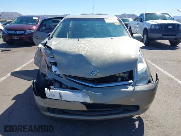 2007 Toyota Prius with VIN JTDKB20U977619909, listed as a IAAI auction lot 41829445 with 113,136 mi miles and . Bid and sale history available at carsss.com. Image 11.