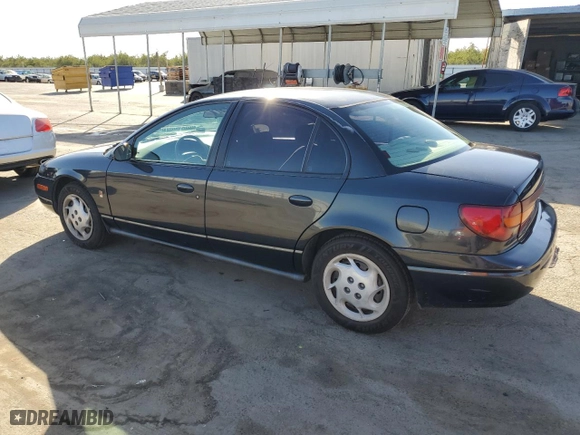 2002 Saturn SL with VIN 1G8ZK52772Z259506, listed as a Copart auction lot 76831904 with 181,258 mi miles and Salvage Title. Bid and sale history available at carsss.com. Image 2.