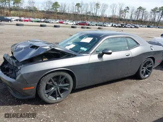 2016 Dodge Challenger SXT Plus with VIN 2C3CDZAG5GH323195, listed as a IAAI auction lot 42019175 with 79,968 mi miles. Bid and sale history available at carsss.com. Image 14.