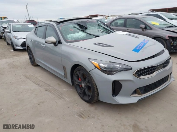 2018 Kia Stinger GT2 with VIN KNAE55LC6J6015897, listed as a IAAI auction lot 41334513 with 126,349 mi miles. Bid and sale history available at carsss.com. Image 1.