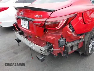 2021 Infiniti Q50 Red Sport 400 with VIN JN1FV7DP7MM850432, listed as a IAAI auction lot 42057935 with 15,936 mi miles and . Bid and sale history available at DreamBid. Image 22.