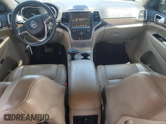 2014 Jeep Grand Cherokee Limited with VIN 1C4RJFBT2EC471846, listed as a Copart auction lot 63637415 with 130,262 mi miles and Salvage title. Bid and sale history available at DreamBid. Image 8.