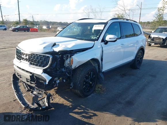 2023 Kia Telluride SX Prestige X-Pro with VIN 5XYP5DGC6PG351443, listed as a IAAI auction lot 41548694 with 32,665 mi miles and . Bid and sale history available at DreamBid. Image 2.