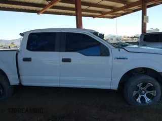 2015 Ford F-150 XLT with VIN 1FTEW1C81FKE76735, listed as a IAAI auction lot 41826968 with 160,530 mi miles and . Bid and sale history available at carsss.com. Image 13.