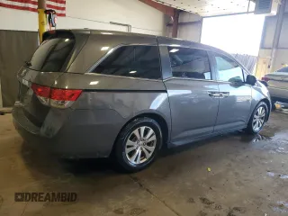 2014 Honda Odyssey EX-L with VIN 5FNRL5H6XEB134849, listed as a Copart auction lot 63617435 with 127,491 mi miles and Salvage title. Bid and sale history available at DreamBid. Image 3.