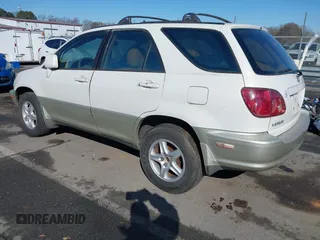 1999 Lexus RX 300 Luxury SUV with VIN JT6HF10U3X0052413, listed as a IAAI auction lot 41404927 with 211,660 mi miles. Bid and sale history available at carsss.com. Image 3.