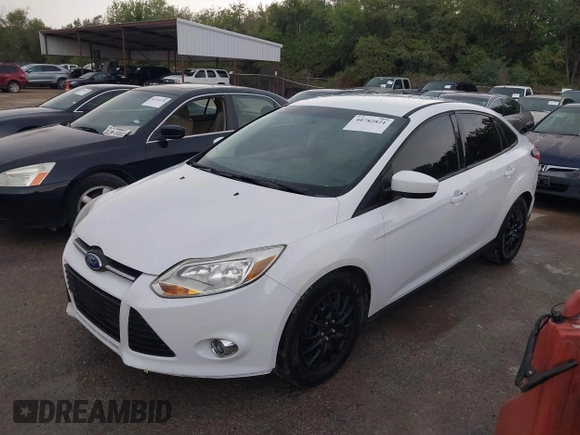 2012 Ford Focus SE z VIN 1FAHP3F29CL141649, wystawiony jako IAAI lot #40782821 z przebiegiem 266 683 mil mil oraz . Historia ofert i sprzedaży dostępna na DreamBid. Obrazek 2.
